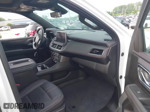 2023 Chevrolet Tahoe RST z VIN 1GNSKRKD7PR506168, wystawiony jako IAAI lot #42833878 z przebiegiem Nie podano mil oraz . Historia ofert i sprzedaży dostępna na DreamBid. Obrazek 5.