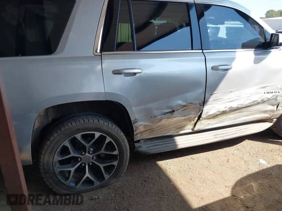 2015 Chevrolet Tahoe LT with VIN 1GNSCBKC2FR500868, listed as a IAAI auction lot 43368598 with 212,885 mi miles and . Bid and sale history available at DreamBid. Image 6.