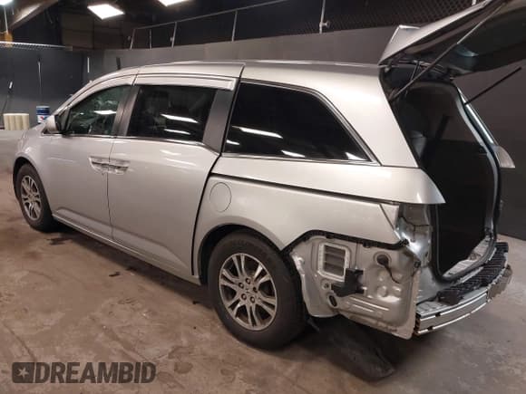 ✅ 2012 Honda Odyssey EX-L • VIN: 5FNRL5H67CB048962 • Lot: 42286708. Listed on IAAI with 131,403 mi. Free auction sales archive from the USA and detailed vehicle history report at DreamBid. Image 3.