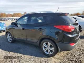 2011 Hyundai Tucson GLS z VIN KM8JU3AC5BU243989, wystawiony jako Copart lot #91693925 z przebiegiem 151 662 mil mil oraz Czysty tytuł • Clean title. Historia ofert i sprzedaży dostępna na DreamBid. Obrazek 2.