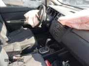 ✅ 2009 Nissan Versa S • VIN: 3N1BC13E39L409030 • Lot: 42850579. Listed on IAAI with 129,129 mi. Free auction sales archive from the USA and detailed vehicle history report at DreamBid. Image 5.