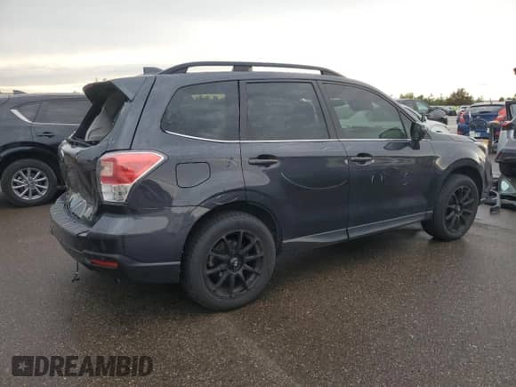 2018 Subaru Forester Limited with VIN JF2SJARCXJH519716, listed as a Copart auction lot 82580805 with 137,336 mi miles and Salvage title. Bid and sale history available at DreamBid. Image 3.