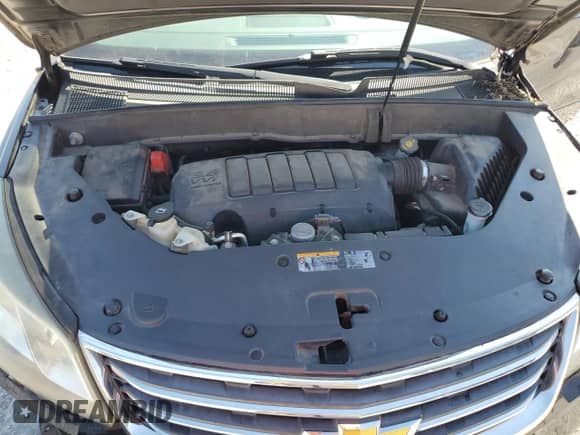 2015 Chevrolet Traverse LT с VIN 1GNKRHKD1FJ209593, выставлен на аукционе Copart как лот 82192355 с пробегом 88 291 миль миль и Списание • Salvage title. История ставок и продаж доступна на DreamBid. Изображение 12.