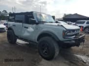 ✅ 2021 Ford Bronco • VIN: 1FMDE5BHXMLA96979 • Lot: 57878665. Listed on Copart with 20,893 mi. Free auction sales archive from the USA and detailed vehicle history report at DreamBid. Image 4.