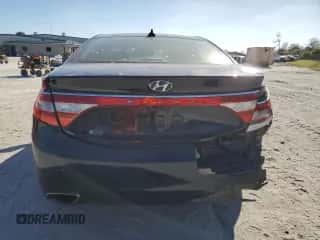 2013 Hyundai Azera z VIN KMHFH4JG4DA269426, wystawiony jako Copart lot #87641235 z przebiegiem 113 533 mil mil oraz Szkoda całkowita • Salvage title. Historia ofert i sprzedaży dostępna na DreamBid. Obrazek 6.