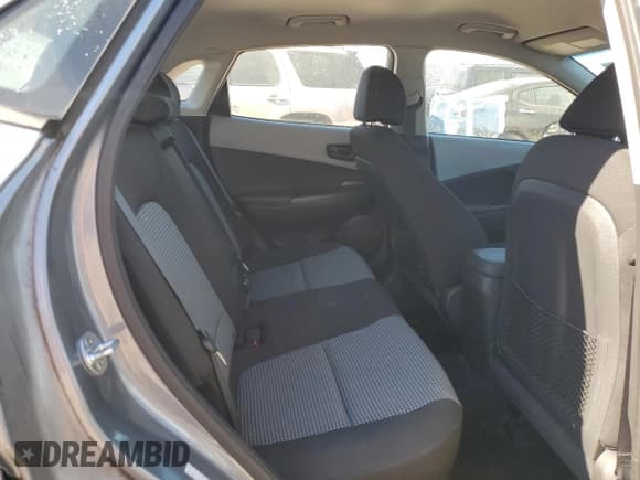 ✅ 2018 Hyundai Kona SE • VIN: KM8K12AA0JU088983 • Лот: 75859764. Опубликован ранее на Copart с пробегом 103 195 миль. Бесплатный доступ к архиву аукционных продаж из США и подробный отчёт об истории автомобиля на DreamBid. Изображение 11.