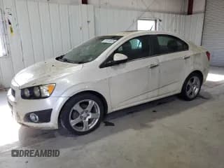 ✅ 2013 Chevrolet Sonic LTZ • VIN: 1G1JE5SHXD4244560 • Lot: 91515575. Listed on Copart with 175,902 mi. Free auction sales archive from the USA and detailed vehicle history report at DreamBid. Image 1.