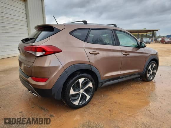 2016 Hyundai Tucson Sport z VIN KM8J33A2XGU241561, wystawiony jako Copart lot #85083245 z przebiegiem 95 773 mil mil oraz Czysty tytuł • Clean title. Historia ofert i sprzedaży dostępna na DreamBid. Obrazek 3.