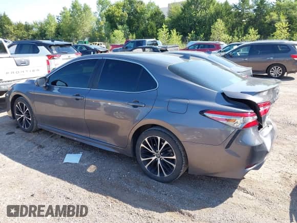 2019 Toyota Camry LE z VIN 4T1B11HK9KU161472, wystawiony jako IAAI lot #43127580 z przebiegiem 104 626 mil mil oraz . Historia ofert i sprzedaży dostępna na DreamBid. Obrazek 14.