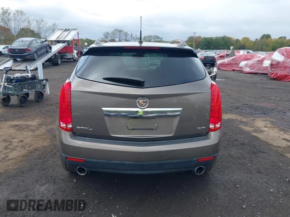 ✅ 2014 Cadillac SRX Performance Collection • VIN: 3GYFNFE34ES570577 • Lot: 43478775. Wystawiony na IAAI z przebiegiem 89 869 mil. Bezpłatny archiwum sprzedaży aukcyjnych z USA i szczegółowy raport historii pojazdu na DreamBid. Zdjęcie 16.