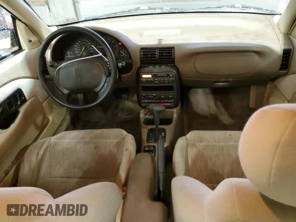 1995 Saturn SL с VIN 1G8ZK5271SZ238117, выставлен на аукционе Copart как лот 83723624 с пробегом 80 535 миль миль и Чистый • Clean title. История ставок и продаж доступна на DreamBid. Изображение 8.