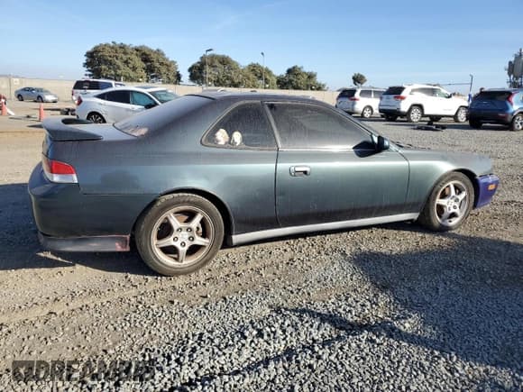 ✅ 1997 Honda Prelude • VIN: JHMBB6141VC015571 • Лот: 77912254. Опубликован ранее на Copart с пробегом 240 373 миль. Бесплатный доступ к архиву аукционных продаж из США и подробный отчёт об истории автомобиля на DreamBid. Изображение 3.