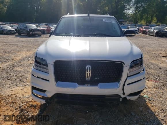 ✅ 2021 Lincoln Navigator Black Label • VIN: 5LMJJ2TT5MEL08415 • Lot: 52850085. Wystawiony na Copart z przebiegiem 51 186 mil. Bezpłatny archiwum sprzedaży aukcyjnych z USA i szczegółowy raport historii pojazdu na DreamBid. Zdjęcie 5.