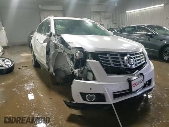 ✅ 2016 Cadillac SRX Performance Collection • VIN: 3GYFNCE39GS568583 • Lot: 93201535. Listed on Copart with 104,161 mi. Free auction sales archive from the USA and detailed vehicle history report at DreamBid. Image 14.