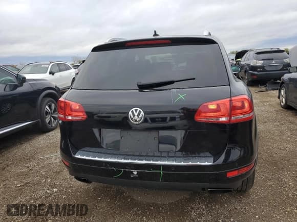 ✅ 2012 Volkswagen Touareg Sport • VIN: WVGFF9BP7CD001145 • Lot: 87206215. Wystawiony na Copart z przebiegiem 115 306 mil. Bezpłatny archiwum sprzedaży aukcyjnych z USA i szczegółowy raport historii pojazdu na DreamBid. Zdjęcie 6.