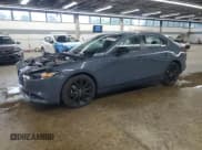 ✅ 2025 Mazda 3 S Carbon Edition • VIN: 3MZBPBCM8SM455660 • Lot: 67098095. Listed on Copart with 14,201 mi. Free auction sales archive from the USA and detailed vehicle history report at DreamBid. Image 1.