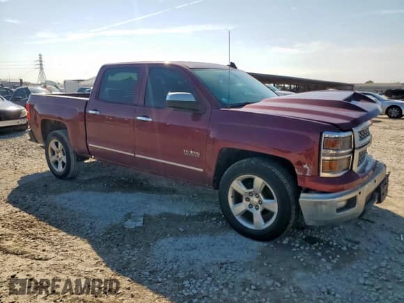 2015 Chevrolet Silverado 1500 LT with VIN 3GCPCREC7FG297544, listed as a Copart auction lot 82291355 with 133,901 mi miles and Salvage title. Bid and sale history available at DreamBid. Image 4.