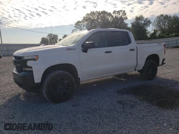 ✅ 2021 Chevrolet Silverado 1500 LT Trail Boss • VIN: 3GCPYFED7MG450753 • Lot: 76287124. Wystawiony na Copart z przebiegiem 34 478 mil. Bezpłatny archiwum sprzedaży aukcyjnych z USA i szczegółowy raport historii pojazdu na DreamBid. Zdjęcie 1.