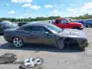 2014 Dodge Challenger SXT z VIN 2C3CDYAG3EH143382, wystawiony jako IAAI lot #43081160 z przebiegiem 35 011 mil mil oraz . Historia ofert i sprzedaży dostępna na DreamBid. Obrazek 13.