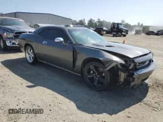 2009 Dodge Challenger R/T z VIN 2B3LJ54T09H511097, wystawiony jako Copart lot #68181824 z przebiegiem 182 596 mil mil oraz Szkoda całkowita • Salvage title. Historia ofert i sprzedaży dostępna na DreamBid. Obrazek 4.