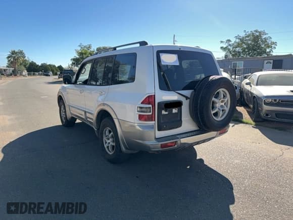✅ 2002 Mitsubishi Montero Limited • VIN: JA4MW51R82J013015 • Лот: 92850345. Опубликован ранее на Copart с пробегом 164 817 миль. Бесплатный доступ к архиву аукционных продаж из США и подробный отчёт об истории автомобиля на DreamBid. Изображение 3.
