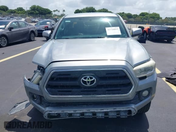 ✅ 2016 Toyota Tacoma SR5 • VIN: 3TMAZ5CN2GM015976 • Лот: 42720812. Опубликован ранее на IAAI с пробегом 169 255 миль. Бесплатный доступ к архиву аукционных продаж из США и подробный отчёт об истории автомобиля на DreamBid. Изображение 12.
