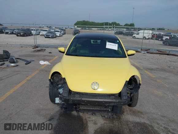 ✅ 2013 Volkswagen Beetle 2.5L • VIN: 3VWHX7AT0DM603661 • Lot: 42464030. Listed on IAAI with 95,159 mi. Free auction sales archive from the USA and detailed vehicle history report at DreamBid. Image 13.