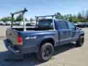 2004 Dodge Dakota Sport с VIN 1D7HG38NX4S501347, выставлен на аукционе Copart как лот 54183084 с пробегом 210 757 миль миль и Списание • Salvage title. История ставок и продаж доступна на DreamBid. Изображение 3.