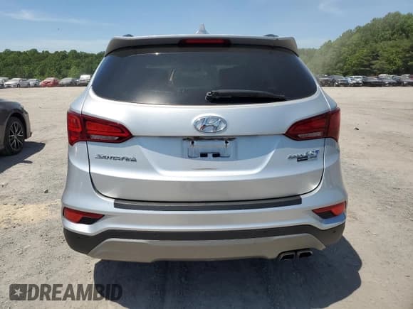 ✅ 2018 Hyundai Santa Fe Ultimate • VIN: 5XYZWDLA1JG508023 • Лот: 55624624. Опубликован ранее на Copart с пробегом 33 893 миль. Бесплатный доступ к архиву аукционных продаж из США и подробный отчёт об истории автомобиля на DreamBid. Изображение 6.