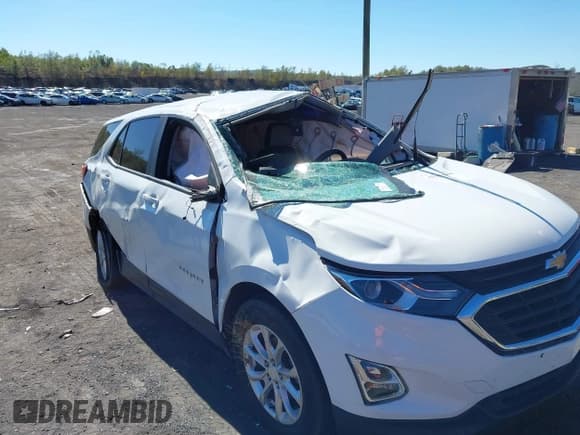 ✅ 2021 Chevrolet Equinox LS • VIN: 3GNAXSEV9MS177393 • Lot: 43393944. Listed on IAAI with 65,872 mi. Free auction sales archive from the USA and detailed vehicle history report at DreamBid. Image 6.