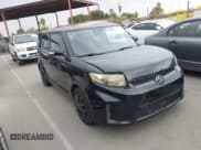 ✅ 2012 Scion xB • VIN: JTLZE4FE4CJ013209 • Lot: 43336960. Listed on IAAI with 129,734 mi. Free auction sales archive from the USA and detailed vehicle history report at DreamBid. Image 1.