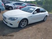 ✅ 2015 BMW 6 Series 650i xDrive • VIN: WBA6B4C5XFD761569 • Lot: 42646861. Listed on IAAI with 55,306 mi. Free auction sales archive from the USA and detailed vehicle history report at DreamBid. Image 2.