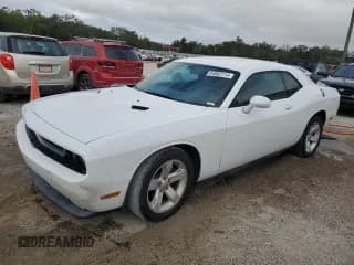 ✅ 2013 Dodge Challenger SXT • VIN: 2C3CDYAG2DH628143 • Lot: 84862114. Wystawiony na Copart z przebiegiem 146 414 mil. Bezpłatny archiwum sprzedaży aukcyjnych z USA i szczegółowy raport historii pojazdu na DreamBid. Zdjęcie 1.