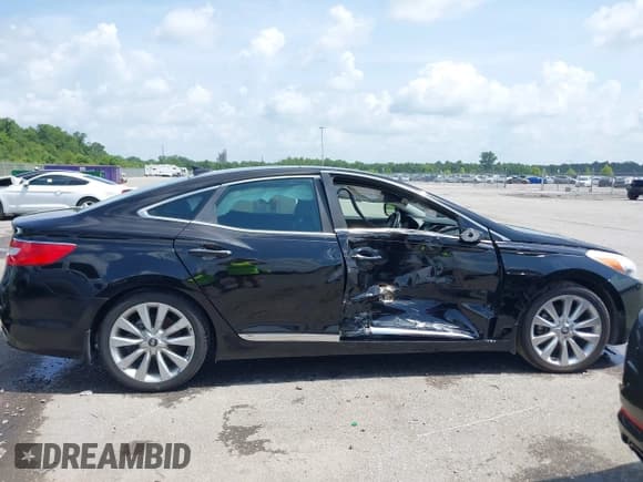 ✅ 2013 Hyundai Azera • VIN: KMHFH4JG0DA310957 • Лот: 42451780. Опубликован ранее на IAAI с пробегом 82 827 миль. Бесплатный доступ к архиву аукционных продаж из США и подробный отчёт об истории автомобиля на DreamBid. Изображение 13.