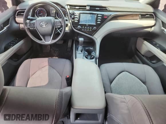 2020 Toyota Camry LE with VIN 4T1C11AK8LU320868, listed as a Copart auction lot 67942255 with 119,976 mi miles and Salvage title. Bid and sale history available at DreamBid. Image 8.