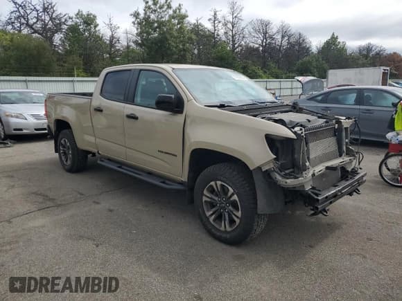✅ 2021 Chevrolet Colorado 4WD Z71 • VIN: 1GCGTDEN6M1289449 • Lot: 71902635. Listed on Copart with 57,528 mi. Free auction sales archive from the USA and detailed vehicle history report at DreamBid. Image 4.