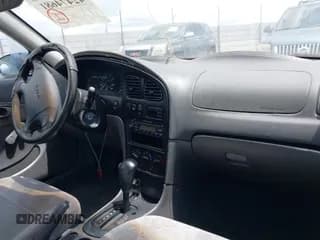 ✅ 2001 Kia Spectra GS • VIN: KNAFB161015032068 • Лот: 42474681. Опубликован ранее на IAAI с пробегом 177 465 миль. Бесплатный доступ к архиву аукционных продаж из США и подробный отчёт об истории автомобиля на DreamBid. Изображение 5.