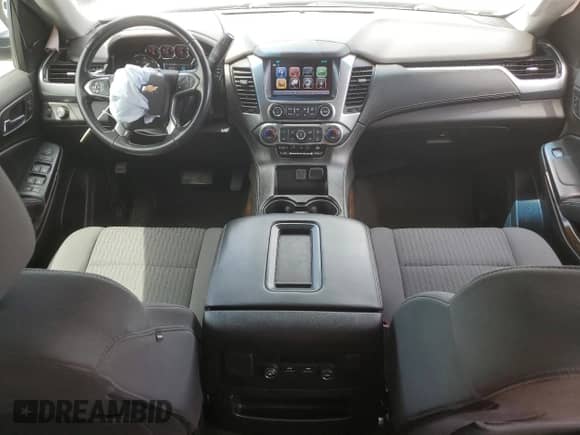 2018 Chevrolet Suburban LS с VIN 1GNSCGKC6JR379977, выставлен на аукционе Copart как лот 54351685 с пробегом 138 574 миль миль и Списание • Salvage title. История ставок и продаж доступна на DreamBid. Изображение 8.