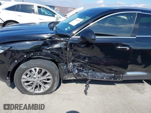 ✅ 2023 Buick Envision Preferred • VIN: LRBAZLR47PD032205 • Lot: 43549973. Listed on IAAI with 21,893 mi. Free auction sales archive from the USA and detailed vehicle history report at DreamBid. Image 18.