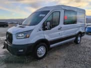✅ 2023 Ford Transit • VIN: 1FTBR2DG3PKA80135 • Lot: 46504465. Wystawiony na Copart z przebiegiem 21 334 mil. Bezpłatny archiwum sprzedaży aukcyjnych z USA i szczegółowy raport historii pojazdu na DreamBid. Zdjęcie 1.