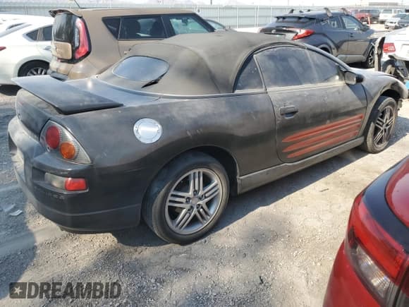 ✅ 2003 Mitsubishi Eclipse GTS • VIN: 4A3AE75H43E019572 • Lot: 64333795. Listed on Copart with 149,780 mi. Free auction sales archive from the USA and detailed vehicle history report at DreamBid. Image 3.