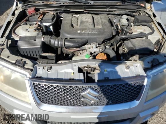 ✅ 2006 Suzuki Grand Vitara Premium • VIN: JS3TD943064100953 • Lot: 84945045. Wystawiony na Copart z przebiegiem 286 846 mil. Bezpłatny archiwum sprzedaży aukcyjnych z USA i szczegółowy raport historii pojazdu na DreamBid. Zdjęcie 11.