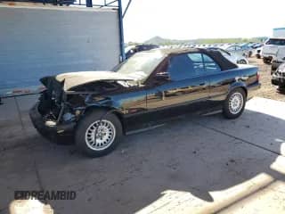 1995 BMW 3 Series 318i with VIN WBABK5327SEC85007, listed as a Copart auction lot 80146115 with 180,000 mi miles and Salvage title. Bid and sale history available at DreamBid. Image 1.