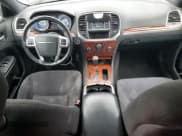 ✅ 2012 Chrysler 300 • VIN: 2C3CCAAGXCH114551 • Lot: 82530925. Listed on Copart with 166,706 mi. Free auction sales archive from the USA and detailed vehicle history report at DreamBid. Image 8.