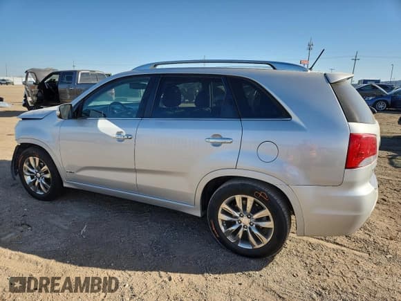 ✅ 2013 Kia Sorento SX • VIN: 5XYKWDA28DG369672 • Lot: 92301185. Listed on Copart with 118,053 mi. Free auction sales archive from the USA and detailed vehicle history report at DreamBid. Image 2.