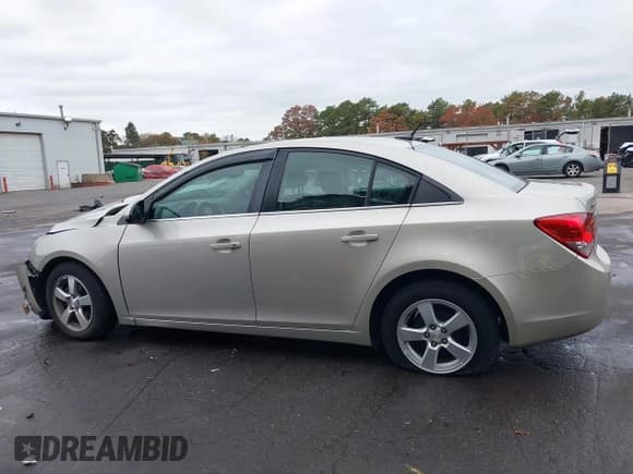 ✅ 2013 Chevrolet Cruze 1LT • VIN: 1G1PC5SBXD7147918 • Lot: 43573003. Listed on IAAI with 79,414 mi. Free auction sales archive from the USA and detailed vehicle history report at DreamBid. Image 15.
