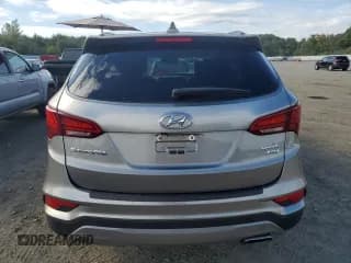✅ 2017 Hyundai Santa Fe 2.4L • VIN: 5XYZUDLB9HG437047 • Лот: 80647435. Опубликован ранее на Copart с пробегом 89 997 миль. Бесплатный доступ к архиву аукционных продаж из США и подробный отчёт об истории автомобиля на DreamBid. Изображение 6.