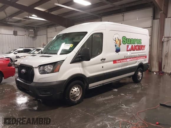 ✅ 2024 Ford Transit Cargo • VIN: 1FTBR2C81RKA01686 • Lot: 41100566. Listed on IAAI with 74,842 mi. Free auction sales archive from the USA and detailed vehicle history report at DreamBid. Image 18.