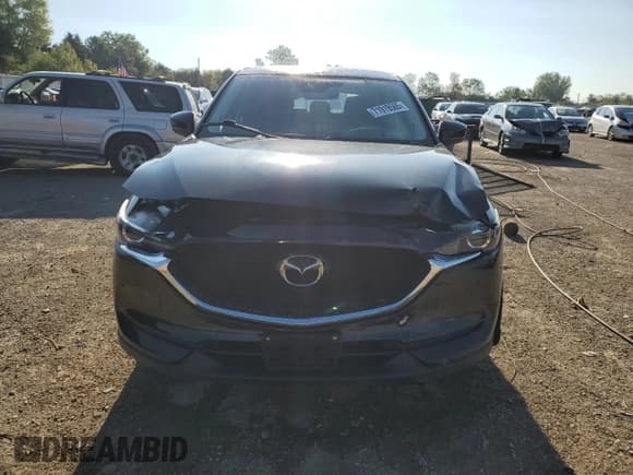 ✅ 2021 Mazda CX-5 Touring • VIN: JM3KFBCM9M0499444 • Lot: 71919565. Wystawiony na Copart z przebiegiem 42 125 mil. Bezpłatny archiwum sprzedaży aukcyjnych z USA i szczegółowy raport historii pojazdu na DreamBid. Zdjęcie 5.