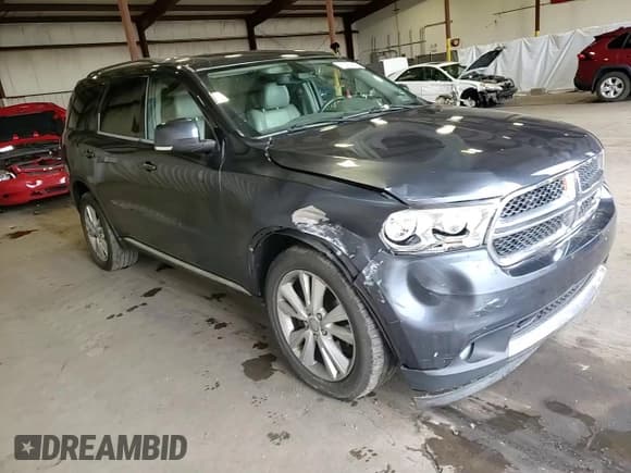 ✅ 2012 Dodge Durango Crew • VIN: 1C4SDJDT0CC322888 • Лот: 82050645. Опубликован ранее на Copart с пробегом 260 067 миль. Бесплатный доступ к архиву аукционных продаж из США и подробный отчёт об истории автомобиля на DreamBid. Изображение 14.